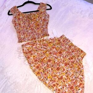 this is a 2 piece dress set. it is a floral colored top and skirt.